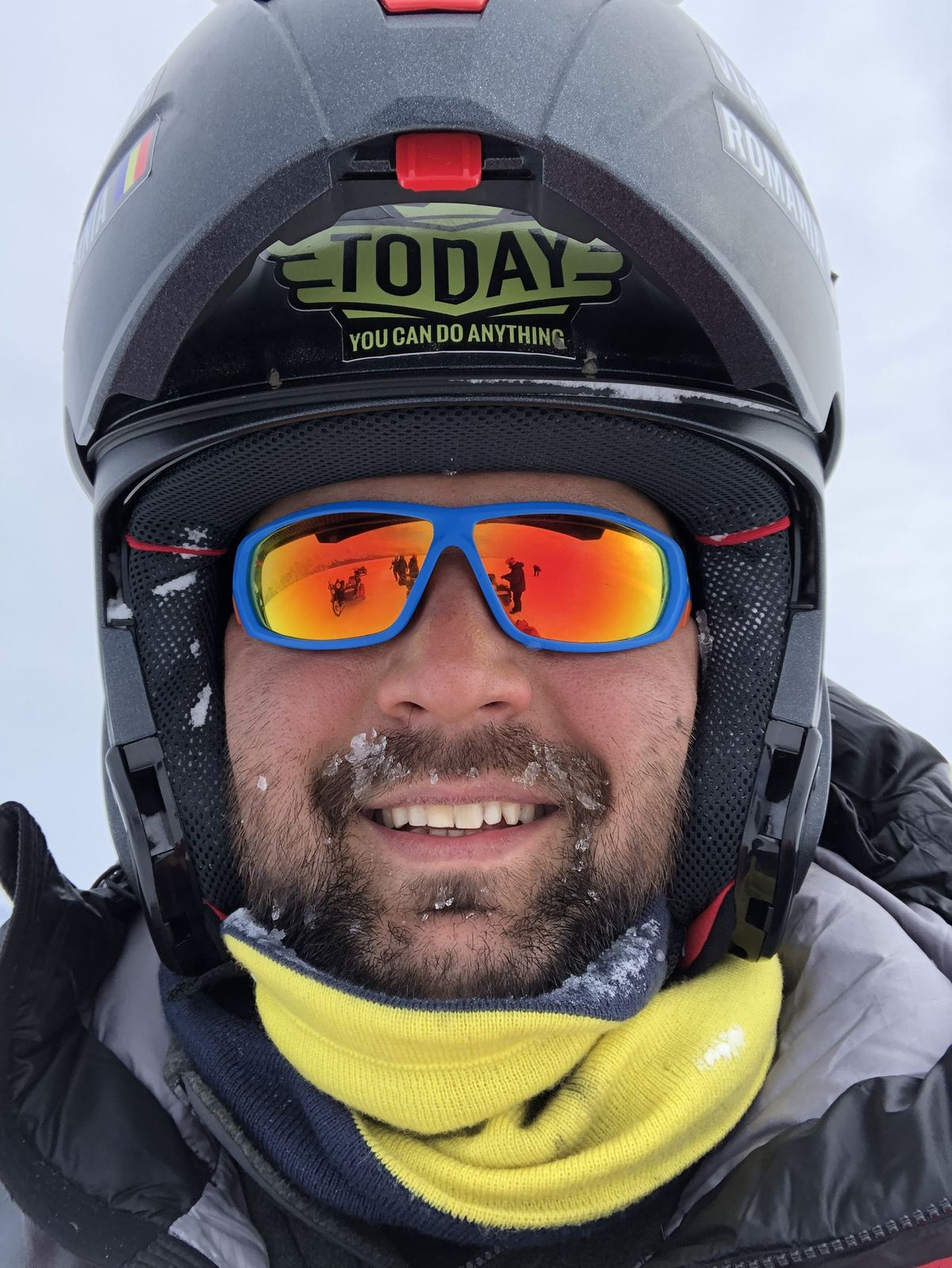 Vlad on Lake Baikal, his helmet and goggles covered in frost